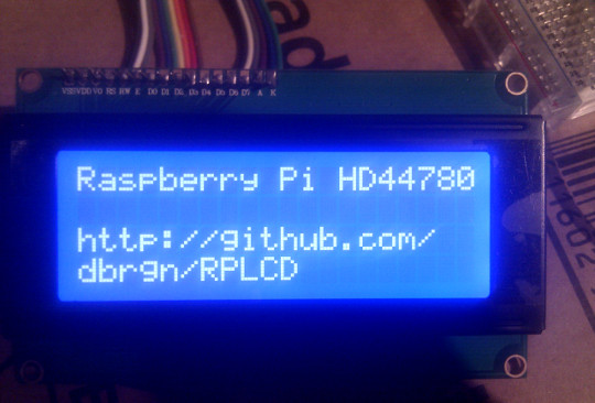 A photo of the HD44780 LCD module displaying some text.